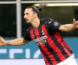 epa08967384 AC Milan's Zlatan Ibrahimovic jubilates after scoring the 0-1 during the Italian cup quarter-final soccer match between FC Inter and AC Milan at Giuseppe Meazza stadium in Milan, Italy, 26 January 2021.  EPA/MATTEO BAZZI