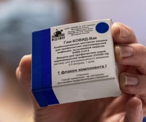 epa09006873 A box containing Russian vaccine Sputnik V is shown by a nurse at Central Hospital of the Hungarian Defence Forces (military) in Budapest, Hungary, 12 February 2021 as the vaccination with Sputnik V agains covid-19 begins in the country.  EPA/ZSOLT SZIGETVARY HUNGARY OUT