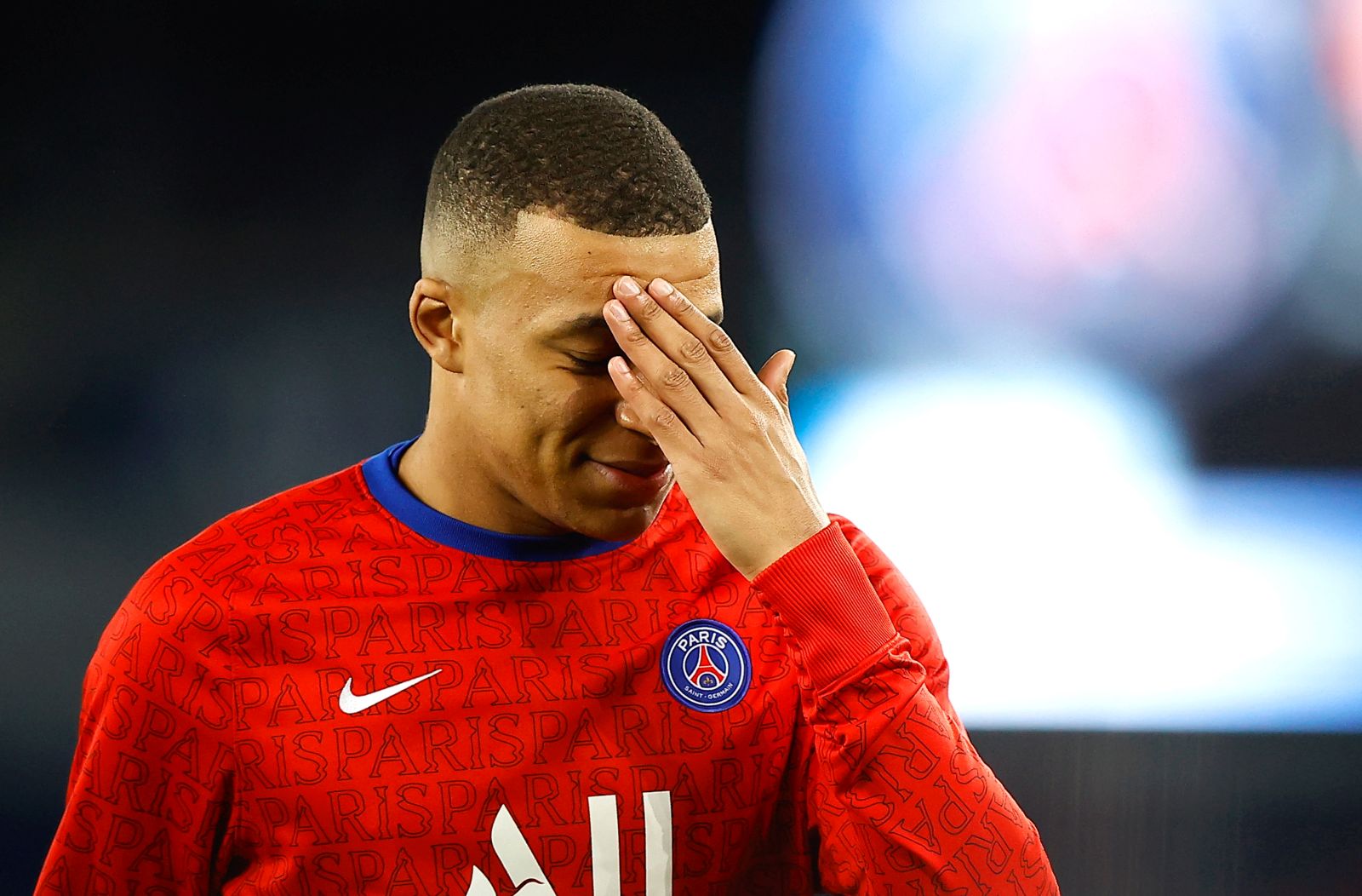 epa09028746 Kylian Mbappe of Paris Saint-Germain warms up for the French Ligue 1 soccer match between Paris Saint-Germain (PSG) and AS Monaco in Paris, France, 21 February 2021.  EPA/IAN LANGSDON