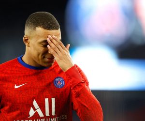 epa09028746 Kylian Mbappe of Paris Saint-Germain warms up for the French Ligue 1 soccer match between Paris Saint-Germain (PSG) and AS Monaco in Paris, France, 21 February 2021.  EPA/IAN LANGSDON