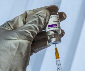 epa09038092 A doctor prepares his syringe with a dose of Oxford Astra-Zeneca COVID-19 vaccine  before a first vaccine injection in Paris, France, 26 February, 2021. France begins vaccination of people aged 50 to 64 with Astrazeneca anti-covid19 vaccine as allowing doctors to vaccinate in their doctor's offices as the country is in the midst of a new wave of coronavirus (COVID-19) infections as the number of cases is increasing day by day.  EPA/CHRISTOPHE PETIT TESSON