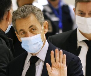 epa09044403 (FILE) - Former French president Nicolas Sarkozy (C) arrives at the court for his trial on corruption charges in the so-called 'wiretapping affair' in Paris, France, 10 December 2020 (reissued 01 March 2021). A verdict in the trial against former French president Sarkozy on bribery is expected to be proclaimed on 01 March 2021. In 2013, Nicolas Sarkozy was using a false name, Paul Bismuth, to make phone calls to his lawyer, Thierry Herzog, about the decision that the Court of Cassation was about to take regarding the seizure of presidential diaries in a separate case.  EPA/YOAN VALAT *** Local Caption *** 56554305