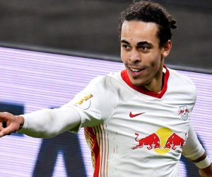 epa09049978 Leipzig's Yussuf Poulsen celebrates after scoring the 1-0 lead during the German DFB Cup quarter final soccer match between RB Leipzig and VfL Wolfsburg in Leipzig, Germany, 03 March 2021.  EPA/STUART FRANKLIN / POOL DFB regulations prohibit any use of photographs as image sequences and/or quasi-video.