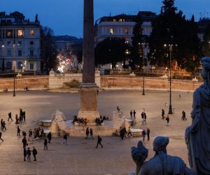epa09054732 People wearing a protective facemask enjoy piazza del Popolo amid the Covid-19 Coronavirus pandemic, in Rome, Italy, 05 March 2021.  EPA/GIUSEPPE LAMI