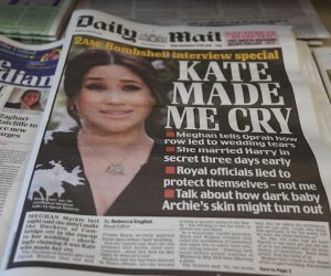 epa09061808 British newspapers on a stand after the US television interview by Oprah Winfrey of Britain's Prince Harry and Meghan Markle, the Duke and Duchess of Sussex in London, Britain, 08 March 2021. ITV will air the interview to the United Kingdom tonight at 9pm.  EPA/FACUNDO ARRIZABALAGA
