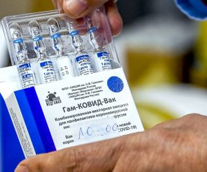epa09065201 A nurse takes out from the box vials of the Russian Sputnik V vaccine against coronavirus - disease  (COVID-19) during vaccination at Jane Sandanski Polyclinic in Skopje, Republic of North Macedonia, 10 March 2021. North Macedonia continues its coronavirus disease (COVID-19) vaccination campaign of medical workers with Russian Sputnik V vaccine.  EPA/GEORGI LICOVSKI