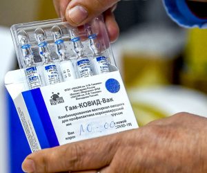epa09065201 A nurse takes out from the box vials of the Russian Sputnik V vaccine against coronavirus - disease  (COVID-19) during vaccination at Jane Sandanski Polyclinic in Skopje, Republic of North Macedonia, 10 March 2021. North Macedonia continues its coronavirus disease (COVID-19) vaccination campaign of medical workers with Russian Sputnik V vaccine.  EPA/GEORGI LICOVSKI