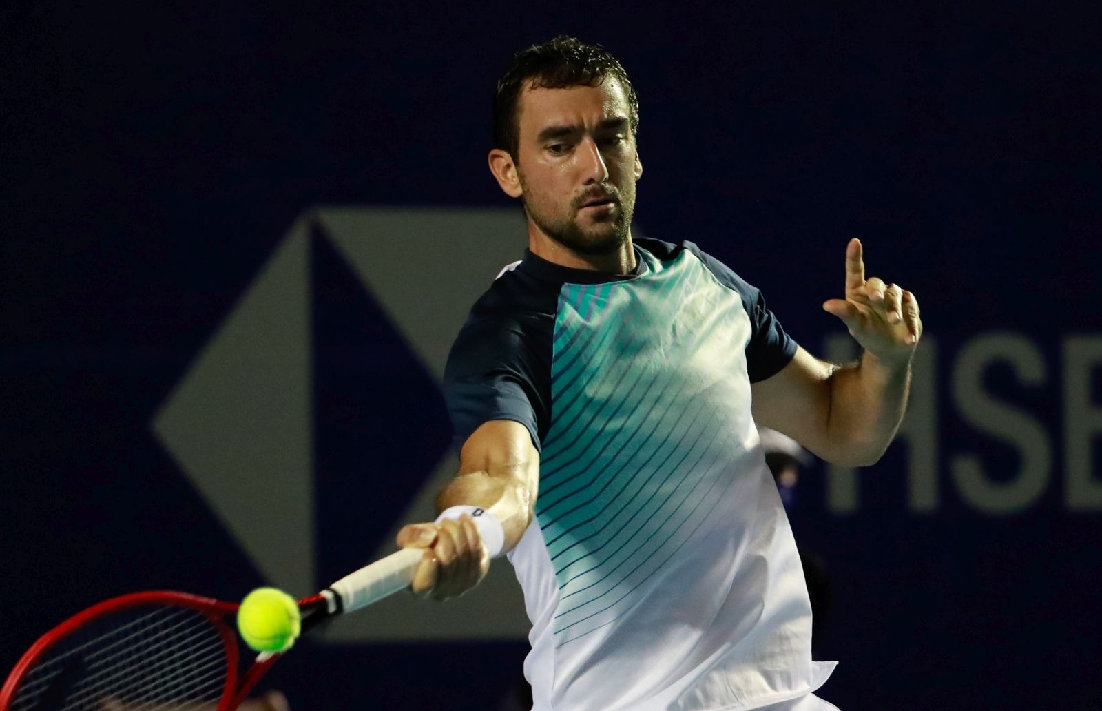 epa09077366 Marin Cilic of Croatia in action against Sebastian Korda of the USA during their  match at the Mexican Open tennis tournament in Acapulco, Guerrero state, Mexico, 15 March 2021.  EPA/David Guzman