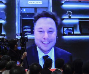 epa09084843 A video shows Elon Musk, CEO of Tesla Inc., speaking during the China Development Forum 2021 at the Diaoyutai State Guesthouse in Beijing, China, 20 March 2021. The China Development Forum 2021 is held in Beijing from 20 to 22 March 2021, with the theme of 'China On a New Journey of Modernisation.'  EPA/WU HONG