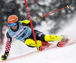 epa09087455 Croatia's Filip Zubcic clears a gate during the first run of the Men's Slalom race at the FIS Alpine Skiing World Cup finals in Lenzerheide, Switzerland, 21 March 2021.  EPA/JEAN-CHRISTOPHE BOTT