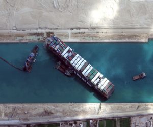epa09103099 A handout satellite image made available by MAXAR Technologies shows excavation around the bow of the 'Ever Given' and dredging operations in progress, in the Suez Canal, Egypt, 28 March 2021. The large container ship Ever Given ran aground in the Suez Canal on 23 March, blocking passage of other ships and causing a traffic jam for cargo vessels.  EPA/MAXAR TECHNOLOGIES HANDOUT MANDATORY CREDIT: SATELLITE IMAGE 2020 MAXAR TECHNOLOGIES -- the watermark may not be removed/cropped -- HANDOUT EDITORIAL USE ONLY/NO SALES