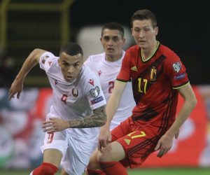 epa09107384 Belarus' Max Ebong Ngome (L) in action against Belgium's Hans Vanaken (R) during the FIFA World Cup 2022 qualifying soccer match between Belgium and Belarus in Leuven, Belgium, 30 March 2021.  EPA/Olivier Hoslet