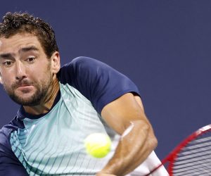 epa09107827 Marin Cilic of Croatia in action against Andrey Rublev of Russia during their Men's singles match at the Miami Open tennis tournament in Miami Gardens, Florida, USA, 30 March 2021.  EPA/RHONA WISE