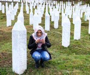 Memorijalni centar Srebrenica - Potočari 20.03.2019, Potocari, Bosna i Hercegovina - 
Porodice stradalih obilaze grobove svojih najmilijih i cekaju izricanje drugostepene presude Radovanu Karadzicu. U Memorijalnom centru u Potocarima organizovano je javno gledanje presude. Nerma Hrvacic pored groba svoga oca.
Photo: Armin Durgut/PIXSELL