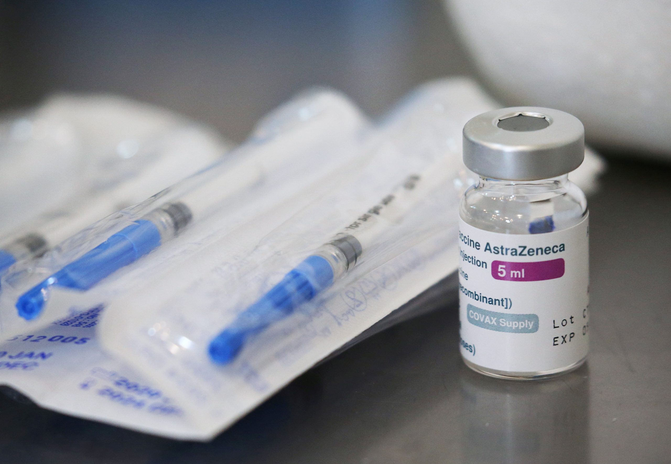 FILE PHOTO: Coronavirus disease (COVID-19) vaccination in Tbilisi FILE PHOTO: A vial with the AstraZeneca coronavirus disease (COVID-19) vaccine is pictured at a hospital in Tbilisi, Georgia March 15, 2021. REUTERS/Irakli Gedenidze/File Photo IRAKLI GEDENIDZE