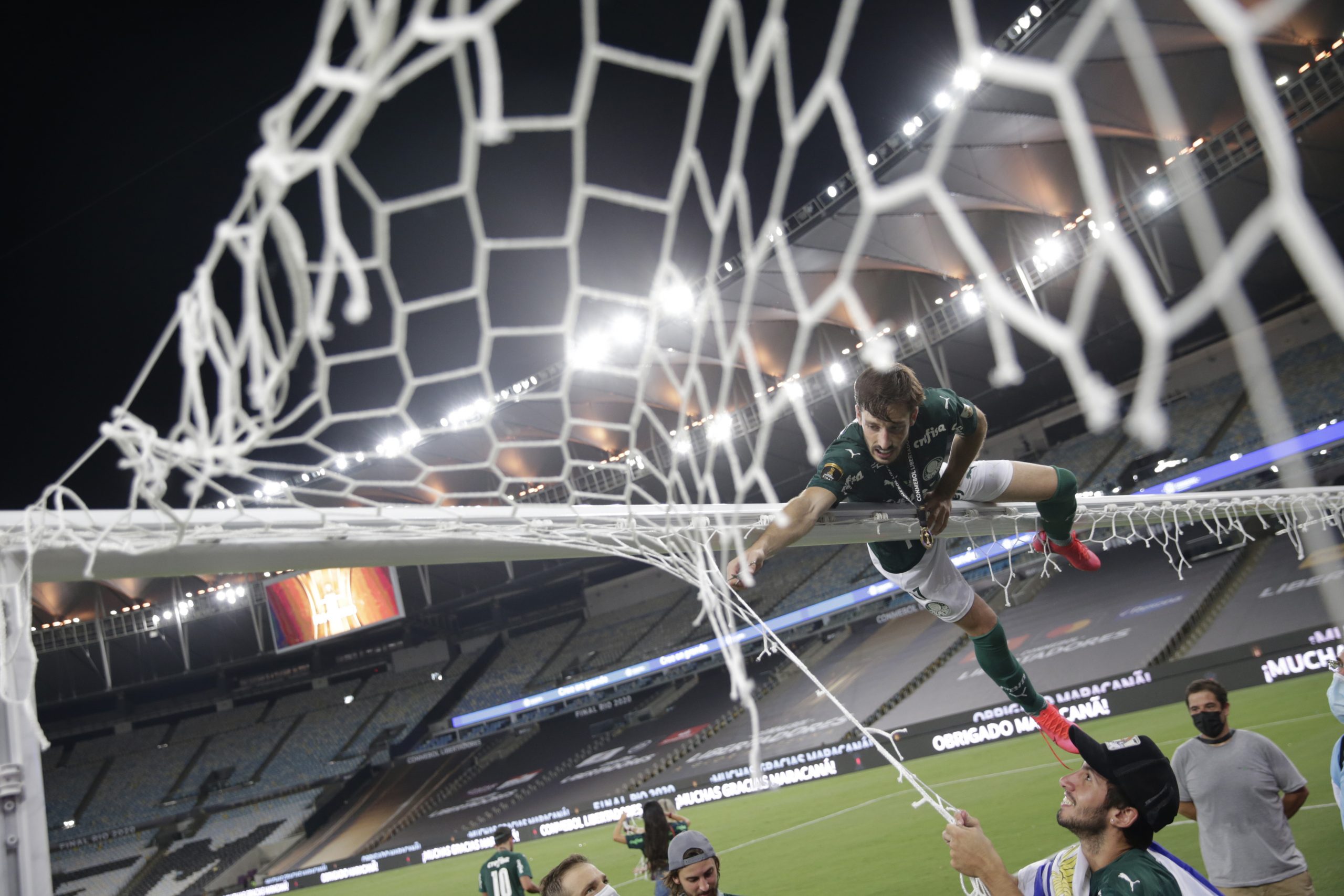 Copa Libertadores - Final - Palmeiras v Santos Soccer Football - Copa Libertadores - Final - Palmeiras v Santos - Estadio Maracana, Rio de Janeiro, Brazil - January 30, 2021 Palmeiras' Matias Vina celebrate winning the Copa Libertadores Pool via REUTERS/Ricardo Moraes RICARDO MORAES