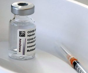 epa09082248 (FILE) - A vial of the Oxford-AstraZeneca Covid-19 vaccine as medical staff prepare doses during a vaccination campaign at Pauls Stradins Clinical University Hospital in Riga, Latvia, 11 February 2021 (reissued 18 March 2021). A committee of the European Medicines Agency (EMA) on 18 March 2021, said although not excluded, there is no direct link between vaccination against Covid-19 with the AstraZeneca vaccine and rare number of blood clots. The EMA upholds its approval of the vaccine and recommends EU countries to continue  the usage of the AstraZeneca.  EPA/TOMS KALNINS *** Local Caption *** 56689309