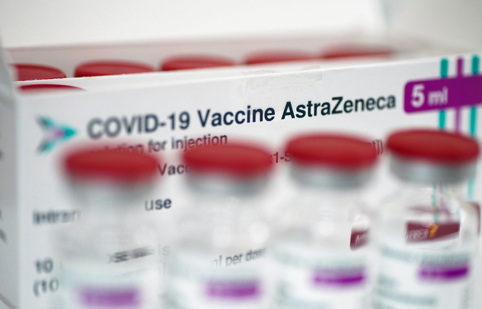 epa09084172 Vials of the AstraZeneca COVID-19 vaccine are displayed at the Southern Hospital in Warsaw, 19 March 2021. Poland has received a new batch of 65,000 coronavirus vaccine doses from the Anglo-Swedish firm AstraZeneca, with a further 72,000 expected next week. EU member countries reintroduce the AstraZeneca Covid-19 vaccine in their inoculation campaigns following the previous day's European Medicines Agency (EMA) announcement to uphold its approval of the vaccine. Some countries stopped giving the vaccine over fears there might be links between the vaccination against Covid-19 with the AstraZeneca vaccine and a rare number of blood clots.  EPA/Leszek Szymanski POLAND OUT