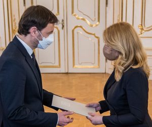 epa09106897 Slovak deputy prime minister Eduard Heger (L) receives a mandate to form new government from Slovak President Zuzana Caputova (R) in Bratislava, Slovakia, 30 March 2021. Slovak Prime Minister Matovic offered his resignation after his coalition partners did not agree with his COVID-19 pandemic management and his agreement to acquire 2 million doses of Russia's Sputnik V vaccine.  EPA/JAKUB GAVLAK