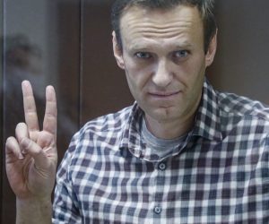 epa09108967 (FILE) Russian opposition leader Alexei Navalny gestures inside a glass cage prior to a hearing at the Babushkinsky District Court in Moscow, Russia, 20 February 2021 (reissued 31 March 2021). Russian opposition leader Alexei Navalny, who serves his 2,5 years sentence in a prison colony in the town of Pokrov in the Vladimir region, announced he is going on hunger strike in a protest of mistreatment in the prison.  EPA/YURI KOCHETKOV *** Local Caption *** 56711412