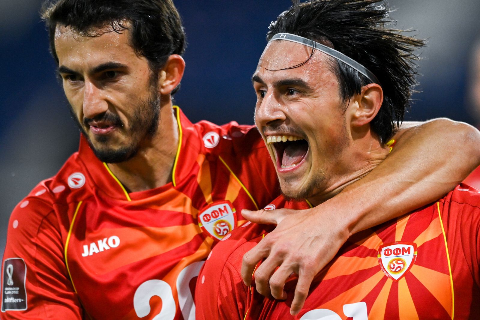 epaselect epa09109559 North Macedonia's Eljif Elmas (R) celebrates next to North Macedonia's Stefan Spirovski (L) after scoring the 2-1 winning goal during the FIFA World Cup 2022 qualifying soccer match between Germany and North Macedonia in Duisburg, Germany, 31 March 2021.  EPA/SASCHA STEINBACH