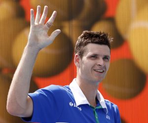 epa09111300 Hubert Hurkacz of Poland waves after defeating Stefanos Tsitsipas of Greece following their quarter-final Men's singles match at the Miami Open tennis tournament in Miami Gardens, Florida, USA, 01 April 2021.  EPA/RHONA WISE