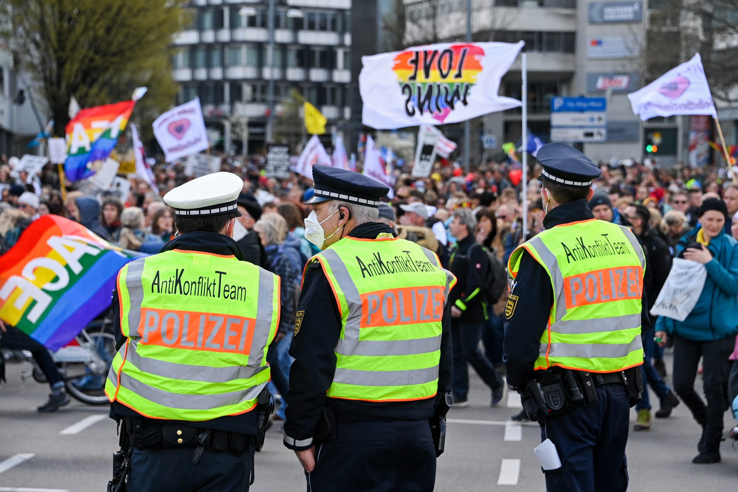 epa09113034 Police officers of the anti conflict team stand guard at the scene of a demonstration held by the ‘Querdenker' (lateral thinkers) movement against the German government's coronavirus restrictions in Stuttgart, Germany, 03 April 2021. Stuttgart is the center of the ‘Querdenker’ movement, founded by entrepreneur Michael Ballweg, as the broadest possible grouping against the government's COVID-19 measures. The police is deployed with several hundred units while thousands are protesting.  EPA/SASCHA STEINBACH