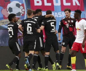 epa09113945 Bayern's Leon Goretzka (2-R) celebrates with teammates after scoring the opening goal during the German Bundesliga soccer match between RB Leipzig and FC Bayern Munich at Red Bull Arena in Leipzig, Germany, 03 April 2021.  EPA/FILIP SINGER / POOL DFL regulations prohibit any use of photographs as image sequences and/or quasi-video.