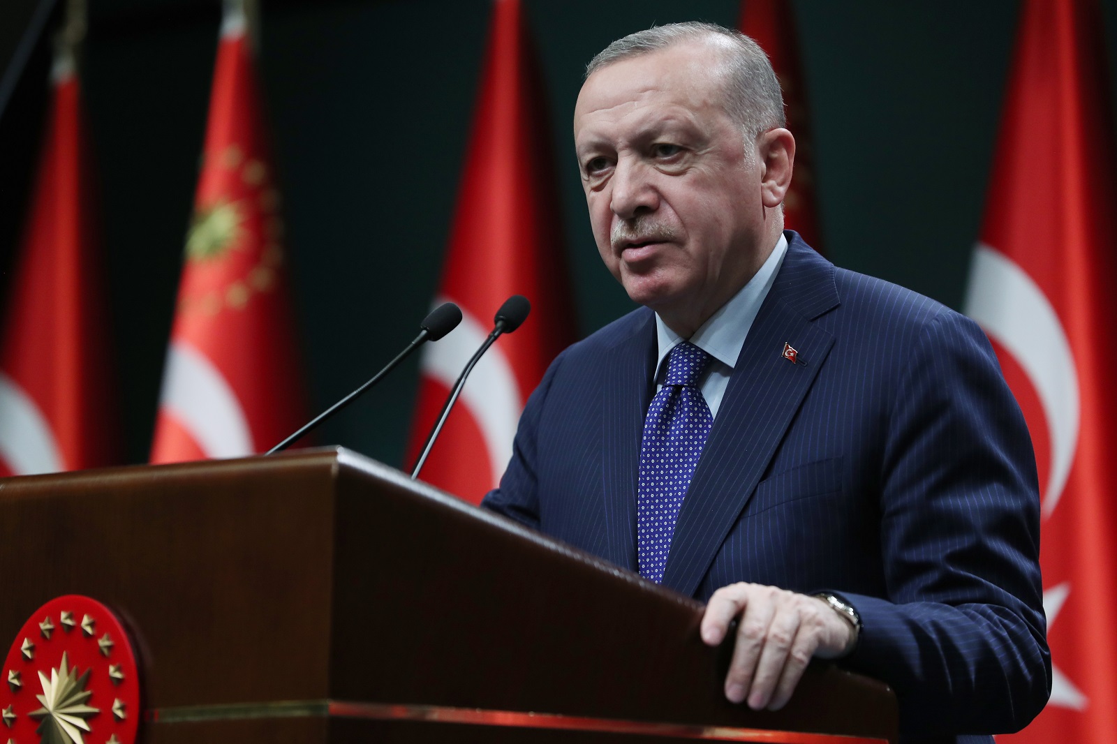 epa09117564 A handout picture provided by the Turkish President Press office shows, Turkish President Recep Tayyip Erdogan speaks to the media after an evaluation meeting at the Presidential Palace in Ankara, Turkey, 05 April 2021. President Erdogan told that for the letter of 104 former admirals over the weekend urging him to abide by the terms of the 1936 Montreux Convention, 'We cannot call this freedom of expression. Freedom of expression does not include sentences that threaten the elected government with a coup'.  EPA/TURKISH PRESIDENT PRESS OFFICE HANDOUT  HANDOUT EDITORIAL USE ONLY/NO SALES