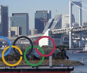 epa09117782 (FILE) A giant Olympic rings monument is seen before the Rainbow bridge at Odaiba Marine Park in Tokyo, Japan, 13 January 2021 (reissued 06 April 2021). On 06 April 2021, North Korea announced it will not participate in the Tokyo Olympics amid the coronavirus pandemic.  EPA/FRANCK ROBICHON