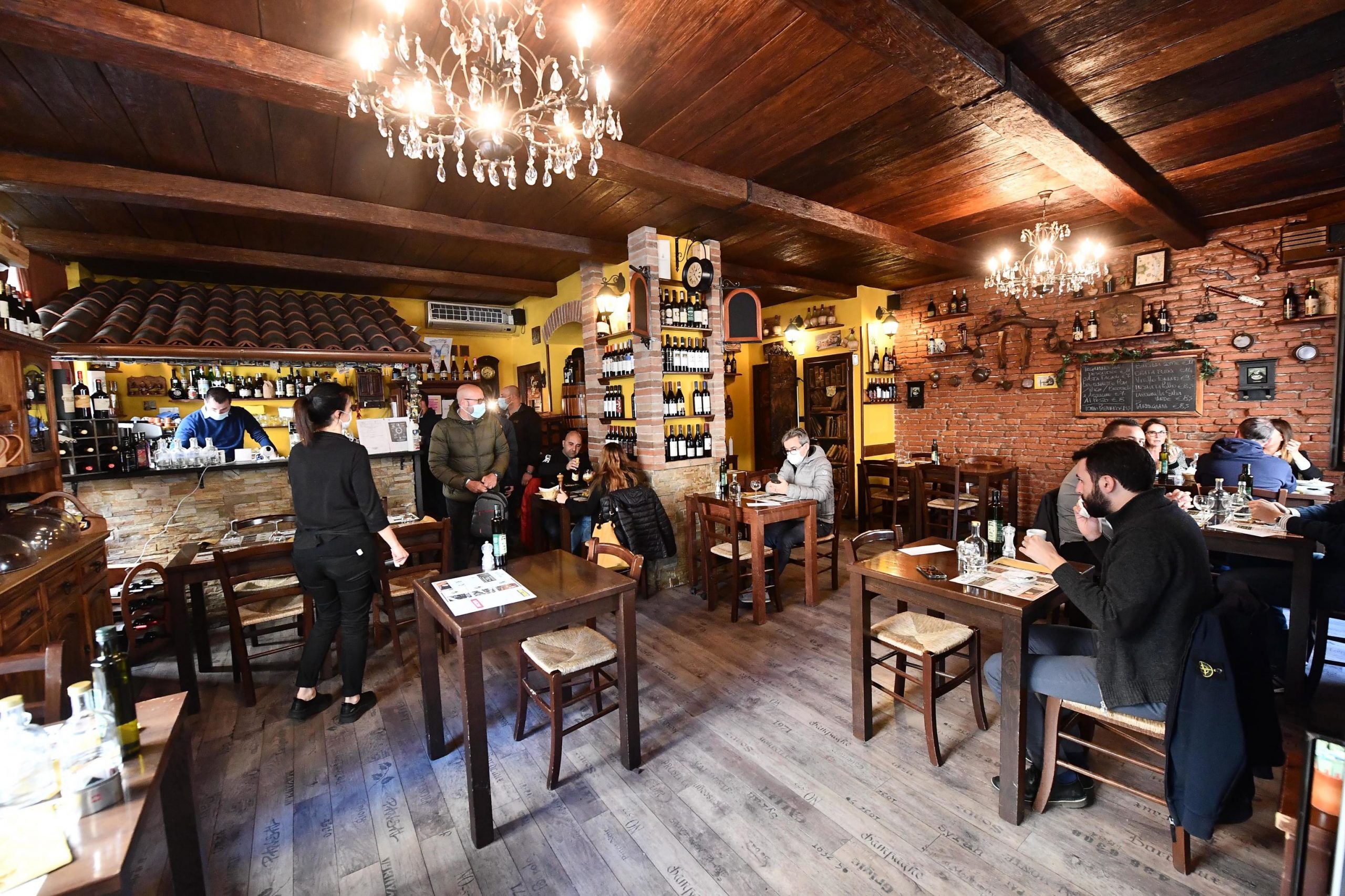 epa09120497 A view of the Locanda del Centro, Genoa, Italy, 07 April 2021. The restaurant reopened its doors, defying the government-imposed restrictions amid the ongoing coronavirus pandemic.  EPA/LUCA ZENNARO