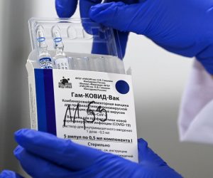 epa09120594 A nurse takes out vials of the Russian Sputnik V vaccine against Covid-19 during vaccination at the Arena 'Boris Trajkovski' in Skopje, North Macedonia, 05 April 2021 (reissued 07 April 2021). The prime minister of the German federal state Bavaria Soeder on 07 April 2021 said the state had signed a preliminary contract over a purchase of Russian COVID-19 vaccine Sputnik V. An approval for the vaccine by the European Medicines Agency (EMA) is pending.  EPA/GEORGI LICOVSKI *** Local Caption *** 56807518