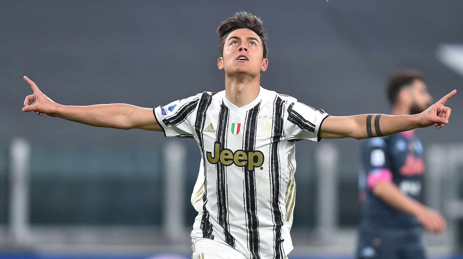 epa09121050 Juventus’ Paulo Dybala celebrates after scoring the 2-0 goal during the Italian Serie A soccer match Juventus FC vs SSC Napoli at the Allianz Stadium in Turin, Italy, 07 April 2021.  EPA/ALESSANDRO DI MARCO