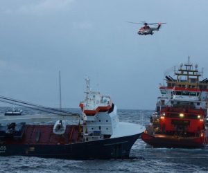 epa09121445 A handout photo made available by Norwegian Coast Guard shows Normand Drott tug boat as it begins to gently turn the Dutch general cargo ship Eemslift Hendrik adrift in the Noorwegian Sea, Norway, 07 April 2020. The Eemslift Hendrika made a distress call on 05 April, the twelve crew members were evacuated the same day. The plan is to tow the ship to Breisundet near Alesund for further examination.  EPA/KV BERGEN / NORWEGIAN COAST GUARD / HANDOUT  HANDOUT EDITORIAL USE ONLY/NO SALES