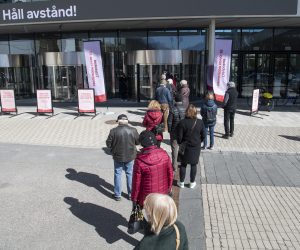 epa09122718 People queue to get vaccine against the Covid-19 outside the Stockholmsmassan exhibition center turned into a mass vaccination center in Stockholm, Sweden, 08 April 2021.  EPA/FREDRIK SANDBERG SWEDEN OUT