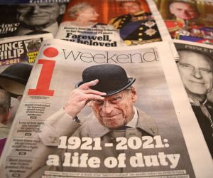epa09125944 The UK's media coverage of the death of Prince Philip in London, Britain, 10 April 2021. Prince Philip, husband of Britain's Queen Elizabeth II, died on 09 April 2021 at Windsor Castle. Buckingham Palace encouraged the public not to bring flowers outside royal palaces to avoid further spread of COVID-19.  EPA/ANDY RAIN