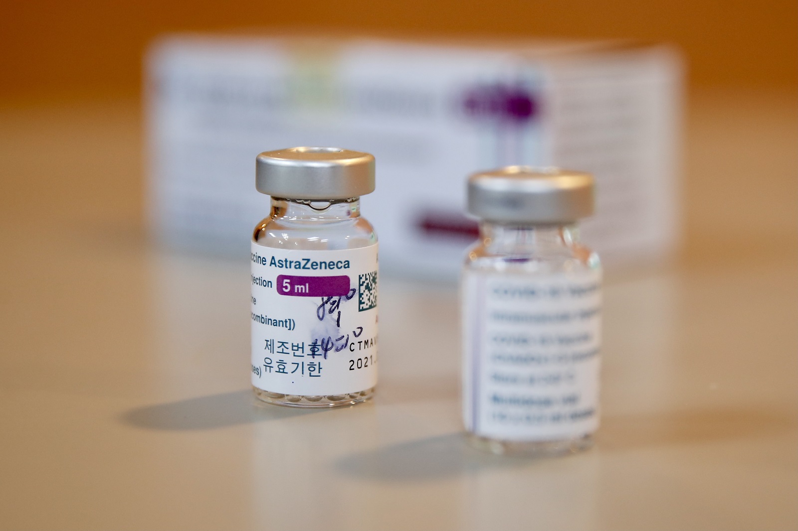 epa09130021 Vials of Vaxzevira (formerly AstraZeneca) COVID-19 vaccine in Taoyuan city, Taiwan, 12 April 2021. Taiwan started administering the second batch of COVID-19 vaccine that arrive in the country on 04 April 2021 under COVAX initiative.  EPA/RITCHIE B. TONGO