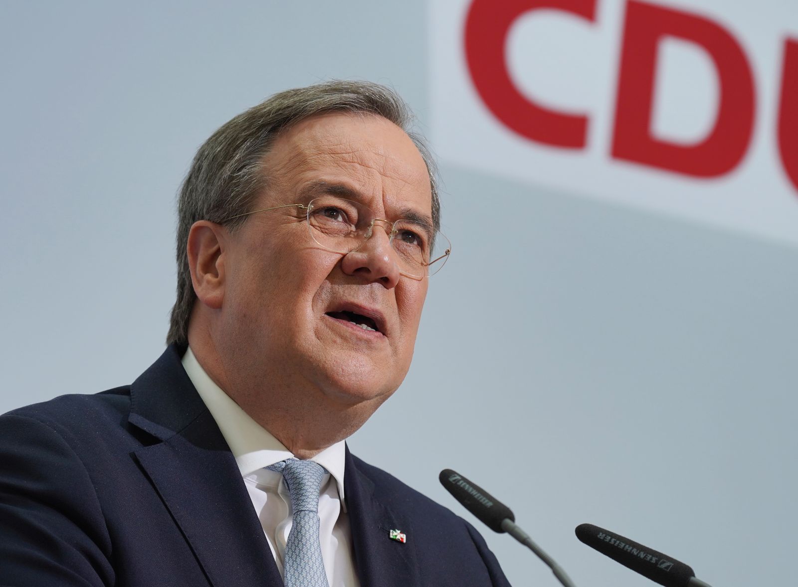 epa09130773 Armin Laschet, leader of the German Christian Democrats (CDU), speaks to the media at CDU headquarters shortly after the CDU leadership met about the chancellor candidacy, in Berlin, Germany, 12 April 2021.  EPA/Sean Gallup / POOL