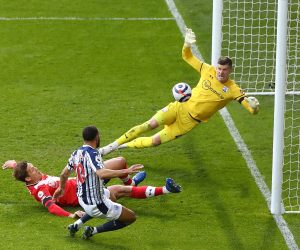 epa09131369 Matt Phillips (front-C) of West Bromwich scores the 2-0 leading during the English Premier League match between West Bromwich Albion and Southampton in West Bromwich, Britain, 12 April 2021.  EPA/Michael Steele / POOL EDITORIAL USE ONLY. No use with unauthorized audio, video, data, fixture lists, club/league logos or 'live' services. Online in-match use limited to 120 images, no video emulation. No use in betting, games or single club/league/player publications.