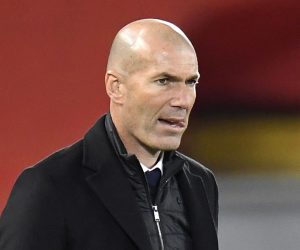 epa09135713 Real Madrid's head coach Zinedine Zidane reacts during the UEFA Champions League quarter final, second leg soccer match between Liverpool FC and Real Madrid in Liverpool, Britain, 14 April 2021.  EPA/Peter Powell
