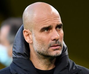 epa09135572 Manchester City's head coach Pep Guardiola looks on prior to the UEFA Champions League quarter final, second leg soccer match between Borussia Dortmund and Manchester City in Dortmund, Germany, 14 April 2021.  EPA/FREDERIC SCHEIDEMANN / POOL