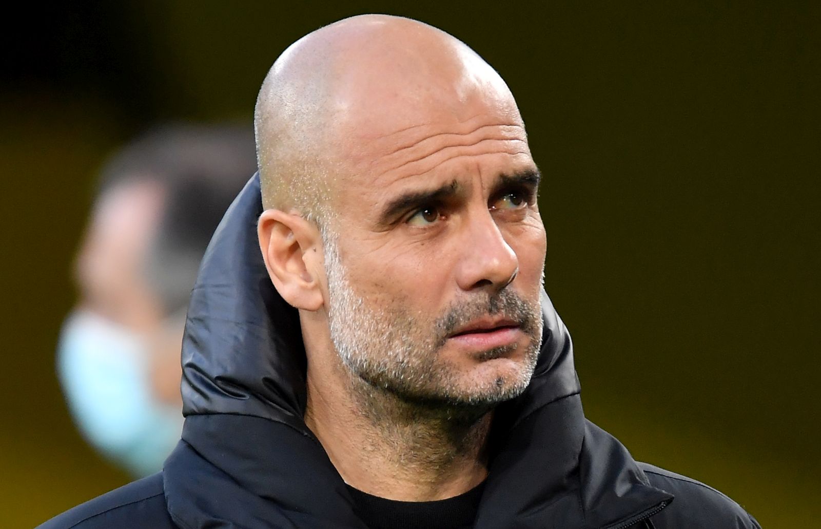 epa09135572 Manchester City's head coach Pep Guardiola looks on prior to the UEFA Champions League quarter final, second leg soccer match between Borussia Dortmund and Manchester City in Dortmund, Germany, 14 April 2021.  EPA/FREDERIC SCHEIDEMANN / POOL