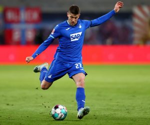 epa09140565 Andrej Kramaric of TSG Hoffenheim controls the ball during the German Bundesliga soccer match between RB Leipzig and TSG Hoffenheim at Red Bull Arena in Leipzig, Germany, 16 April 2021.  EPA/MARTIN ROSE / POOL DFL regulations prohibit any use of photographs as image sequences and/or quasi-video.
