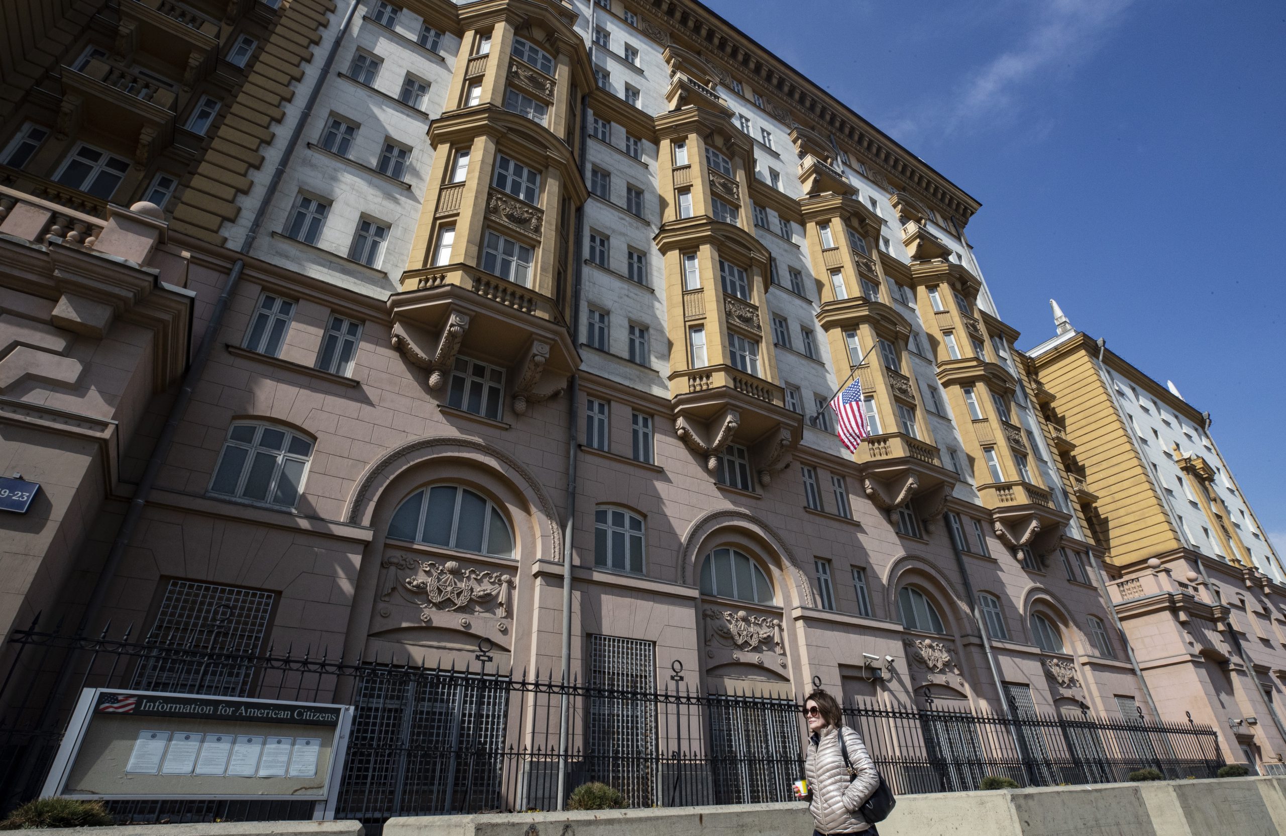 epa09141176 A woman passes by the US embassy building in Moscow, Russia, 17 April 2021. Russia has imposed sanctions against US administration officials 'involved in the implementation of the anti-Russian course.' Eight current and former US officials and personalities, including U.S. Attorney General Merrick Brian Garland, FBI Director Christopher Asher Wray, Director of US National Intelligence (DNI) Avril Danica Haines, will be closed entry to the Russian Federation on an indefinite basis. Russia will expel 10 US diplomats in response to Washington's sanctions imposed on Russia, said Russian Foreign Minister Sergei Lavrov.  EPA/SERGEI ILNITSKY