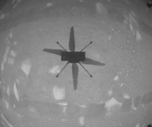 epa09145043 A handout image provided by NASA shows the shadow of the Ingenuity Mars Helicopter during its first test flight on Mars, 19 April 2021. According to NASA, Ingenuity has successfully peformed a short flight on Mars, the first ever helicopter flight on another planet. A key objective for NASA's Perseverance's Rover mission on Mars is astrobiology, including the search for signs of ancient microbial life.  EPA/NASA/JPL-Caltech/HANDOUT  HANDOUT EDITORIAL USE ONLY/NO SALES