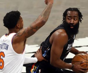epa09117731 Brooklyn Nets guard James Harden (R) looks to pass around New York Knicks guard Elfrid Payton (C) and teammate New York Knicks center Taj Gibson (L) in the first half of the NBA basketball game between the New York Knicks and the Brooklyn Nets at the Barclays Center in Brooklyn, New York, USA, 05 April 2021.  EPA/JASON SZENES SHUTTERSTOCK OUT