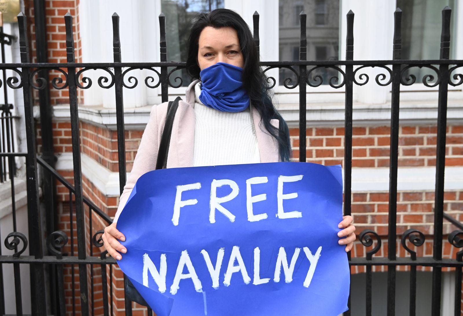 epa09150833 Supporters of Russian opposition leader Alexei Navalny attend a demonstration organized by the group 'Art of Rebel' outside the Russian embassy in London, Britain, 21 April 2021. Rallies supporting Navalny take place in several cities in Europe. Russian opposition leader Alexei Navalny has been transferred from the penal colony No. 2 (IK-2) in Pokrov, Vladimir region, to the regional prison hospital in IK-3 in Vladimir for receiving vitamin therapy. The decision was taken amid Navalny's hunger strike and announced by his team members fearing for his life.  EPA/FACUNDO ARRIZABALAGA