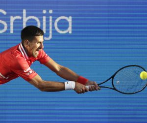 epa09157110 Novak Djokovic of Serbia in action against Aslan Karatsev of Russia during their semi final match of the Serbia Open tennis tournament in Belgrade, Serbia, 24 April 2021.  EPA/ANDREJ CUKIC
