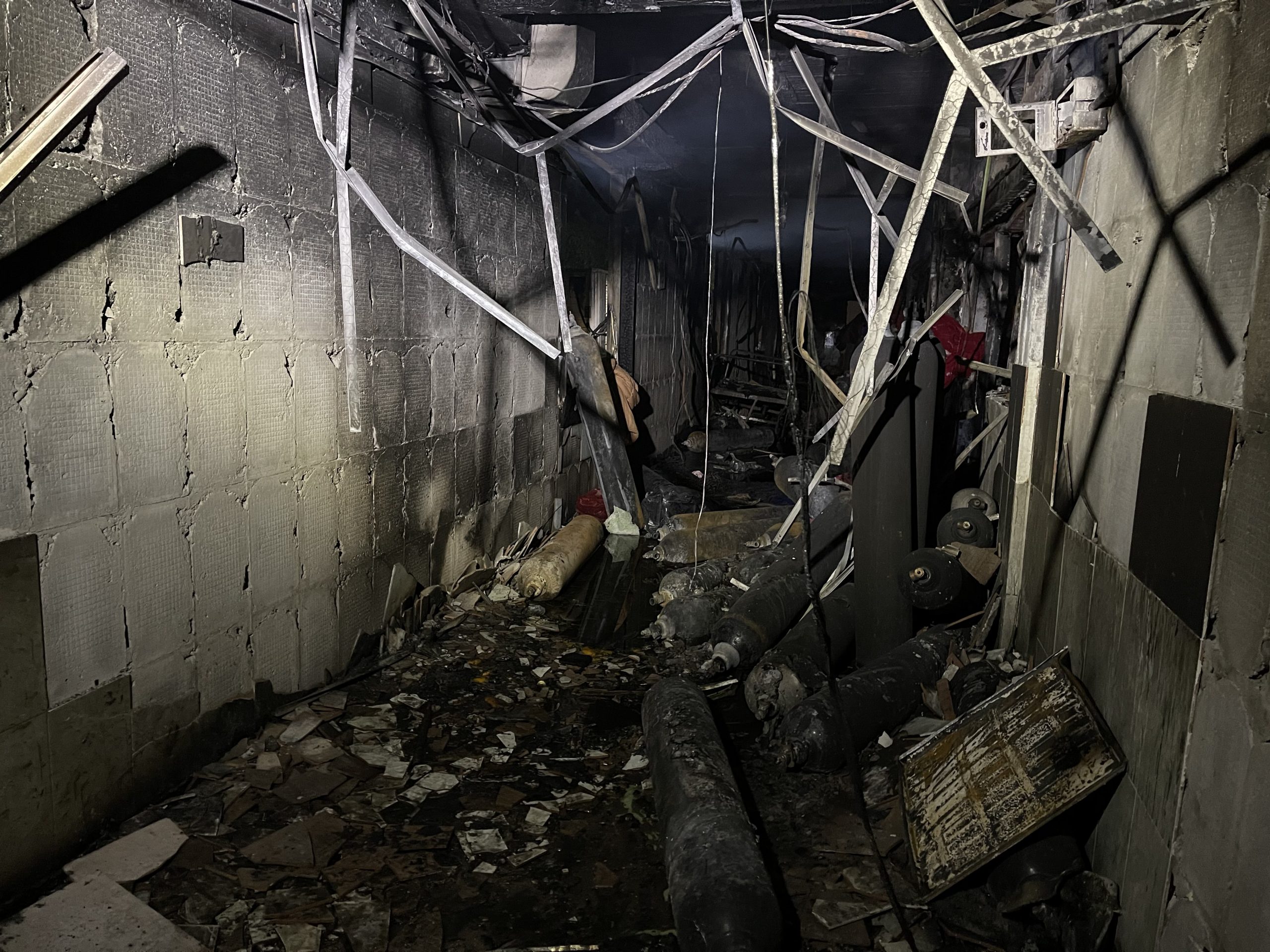 epa09157829 Aftermath of a fire at Ibn Al-Khatib Hospital, south of Baghdad, Iraq, 25 April 2021. At least 27 people died and dozens were injured when a fire broke out following the explosion of oxygen tanks at the hospital equipped to treat COVID-19 patients on 24 April.  EPA/MURTAJA LATEEF