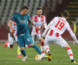 18, February, 2021, Belgrade - The first match of the sixteenth final of the Europa League between FC Red Star and AC Milan was played at the "Rajko Mitic" stadium. Mario Mandzukic, #9 (AC Milan), Mirko Ivanic, #4 (FK Crvena zvezda),  Nemanja Milunovic, #19 (FK Crvena zvezda). Photo: M.M./ATAImages

18, februar, 2021, Beograd - Prva utakamice sesnaestine finala Liga Evrope izmedju FK Crvena zvezda i AC Milan odigrana je na stadionu "Rajko Mitic". Photo: M.M./ATAImages